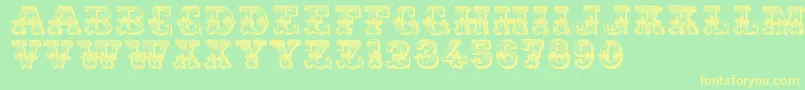Romantiques-fontti – keltaiset fontit vihreällä taustalla