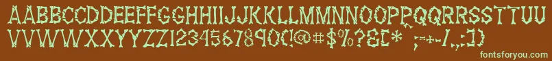 FossilRegular Font – Green Fonts on Brown Background