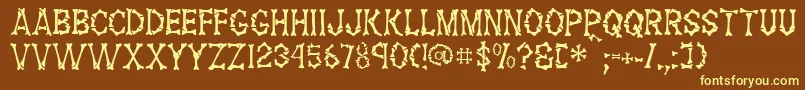 FossilRegular Font – Yellow Fonts on Brown Background