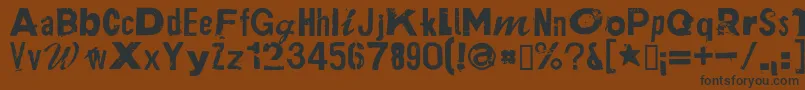 PlakkenRegular-fontti – mustat fontit ruskealla taustalla