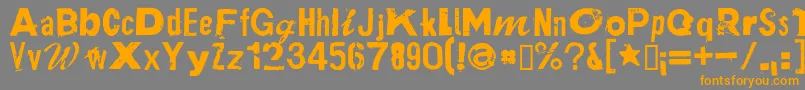 フォントPlakkenRegular – オレンジの文字は灰色の背景にあります。