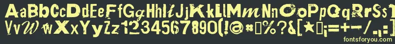 PlakkenRegular Font – Yellow Fonts on Black Background