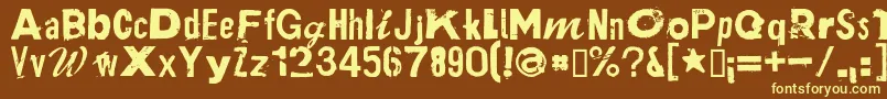 PlakkenRegular-fontti – keltaiset fontit ruskealla taustalla
