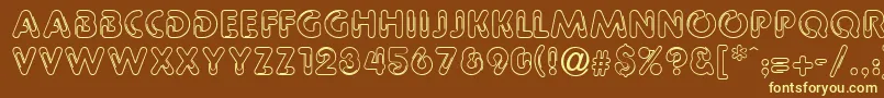 GeClipz Font – Yellow Fonts on Brown Background