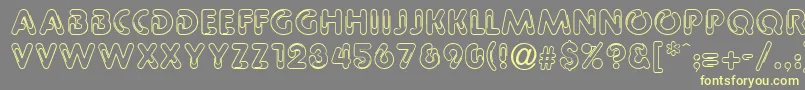 GeClipz Font – Yellow Fonts on Gray Background