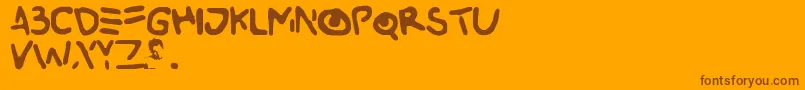 Buried-fontti – ruskeat fontit oranssilla taustalla