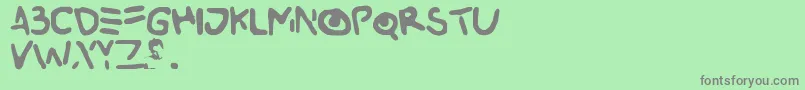 Buried Font – Gray Fonts on Green Background
