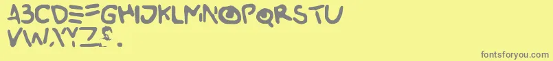 Buried Font – Gray Fonts on Yellow Background