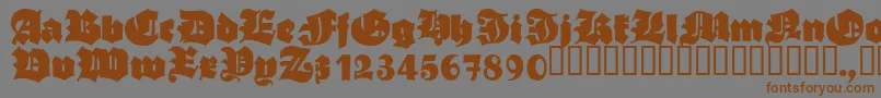 フォントAsgardianwarsBlack – 茶色の文字が灰色の背景にあります。