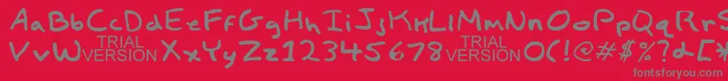 フォントChildsPlayTrialVersion – 赤い背景に灰色の文字