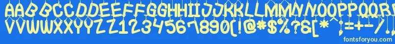 LaQueCuelgaSt-Schriftart – Gelbe Schriften auf blauem Hintergrund