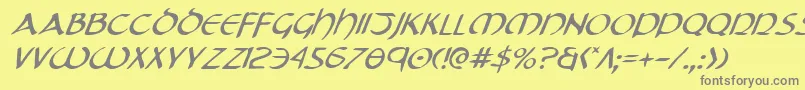 フォントTristrami – 黄色の背景に灰色の文字