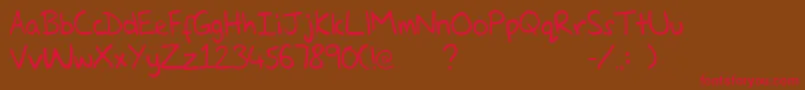GlennsHand Font – Red Fonts on Brown Background