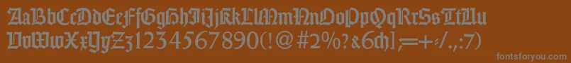 Шрифт WeingothikdbNormal – серые шрифты на коричневом фоне