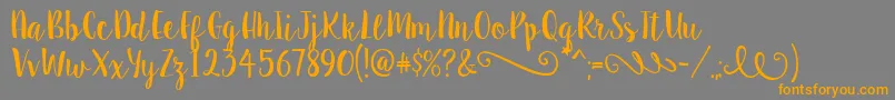 SweetPea Font – Orange Fonts on Gray Background