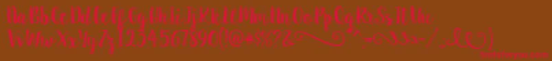 SweetPea Font – Red Fonts on Brown Background