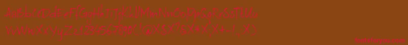 DkAuRevoir-Schriftart – Rote Schriften auf braunem Hintergrund