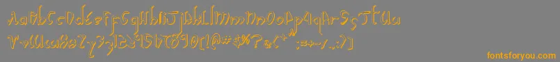 フォントXaphanIiShadow – オレンジの文字は灰色の背景にあります。