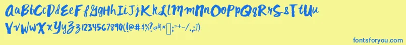 フォントMixkitsch – 青い文字が黄色の背景にあります。