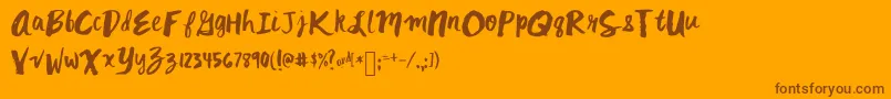Mixkitsch Font – Brown Fonts on Orange Background