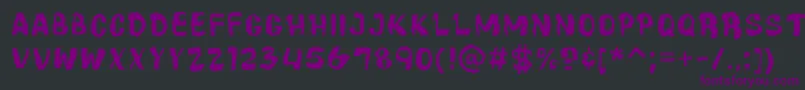 Czcionka CartoonicMassiveWacky – fioletowe czcionki na czarnym tle