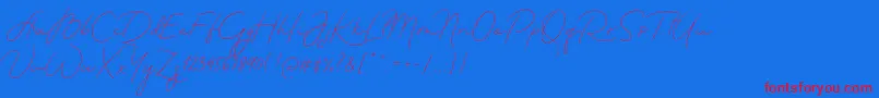 MadeTheartistScriptPersonalUse-Schriftart – Rote Schriften auf blauem Hintergrund