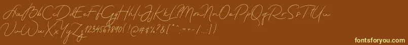 MadeTheartistScriptPersonalUse Font – Yellow Fonts on Brown Background