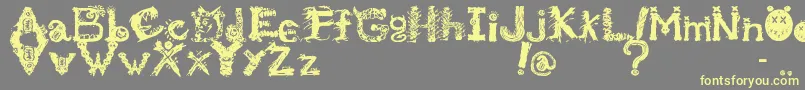MonstrousZosimus-Schriftart – Gelbe Schriften auf grauem Hintergrund