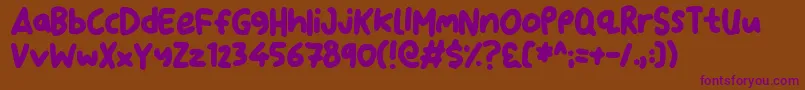 DearSanta Font – Purple Fonts on Brown Background