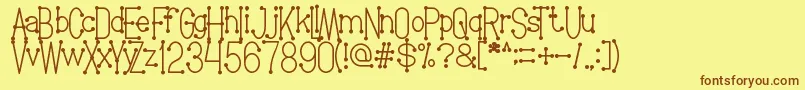 WelcomeToPlanetEarth Font – Brown Fonts on Yellow Background