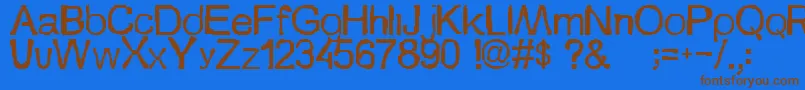 フォントSzionka – 茶色の文字が青い背景にあります。