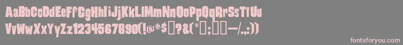 フォントDamag ffy – 灰色の背景にピンクのフォント