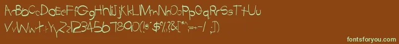 フォントTabathaRegular – 緑色の文字が茶色の背景にあります。