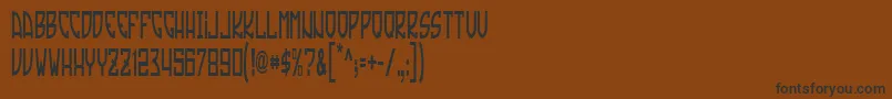 TradizioneSlim-Schriftart – Schwarze Schriften auf braunem Hintergrund