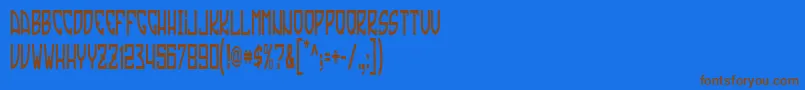 TradizioneSlim Font – Brown Fonts on Blue Background