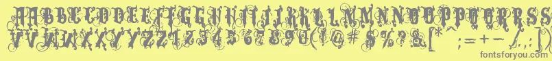 Dominatrix Font – Gray Fonts on Yellow Background