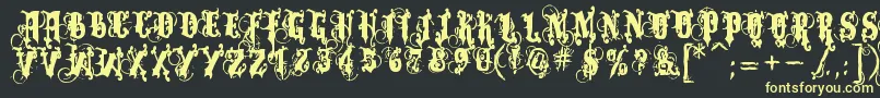 Dominatrix Font – Yellow Fonts on Black Background