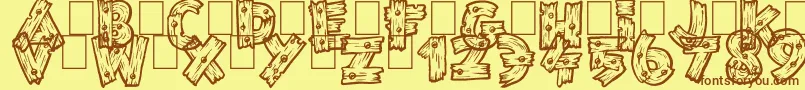 WildTrails-Schriftart – Braune Schriften auf gelbem Hintergrund