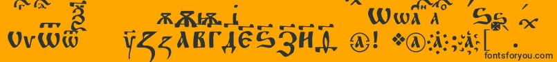 Czcionka Fitachirchc – czarne czcionki na pomarańczowym tle