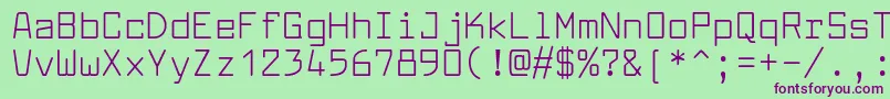 フォントLarabiefontRg – 緑の背景に紫のフォント