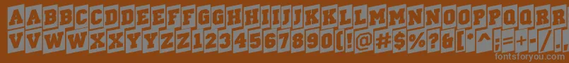 ACampuscmup-fontti – harmaat kirjasimet ruskealla taustalla
