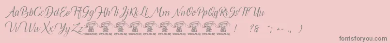 Canelabarkpersonal-Schriftart – Graue Schriften auf rosa Hintergrund