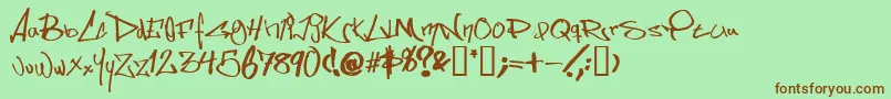 Somesss Font – Brown Fonts on Green Background