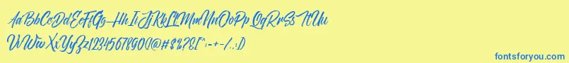 NovithaScriptDemo Font – Blue Fonts on Yellow Background