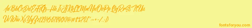 NovithaScriptDemo-Schriftart – Orangefarbene Schriften auf gelbem Hintergrund