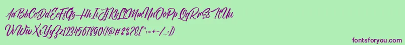NovithaScriptDemo Font – Purple Fonts on Green Background