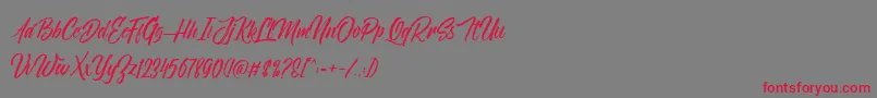 NovithaScriptDemo Font – Red Fonts on Gray Background
