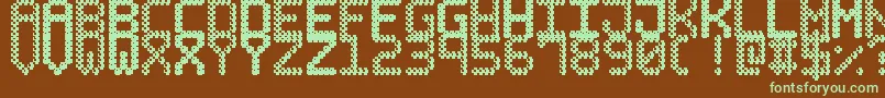 フォントBubblePixel7Dark – 緑色の文字が茶色の背景にあります。
