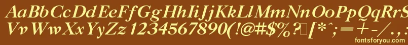 Gaztibit-fontti – keltaiset fontit ruskealla taustalla