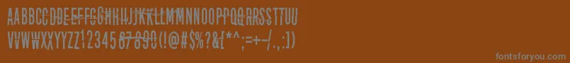 フォントDisturbo – 茶色の背景に灰色の文字